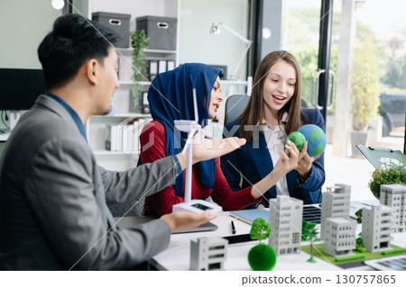 business team people planning and discussing on recycle reduce reuse policy symbol in office meeting room. Green business company and Solar Energy Environment city 130757865