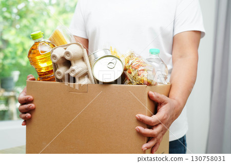 Foodstuffs in donation box for volunteer to help people. 130758031