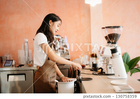 Startup successful small business owner sme woman stand with tablet in cafe Startup successful small business owner sme woman stand with tablet in cafe 130758359