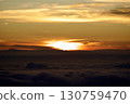 The morning sun rising from the sea of clouds 130759470