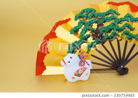 Year of the Horse New Year's Material White Horse and Decorative Fan Gold Background 130759985
