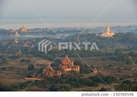 Myanmar, Bagan, view from a hot air balloon, pagodas in the morning mist 130760596