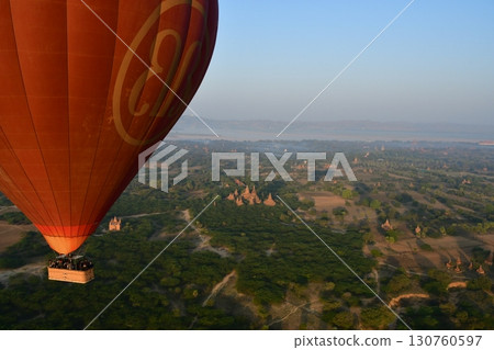 Myanmar, Bagan, view from a hot air balloon, hot air balloons floating in the sky, pagodas 130760597