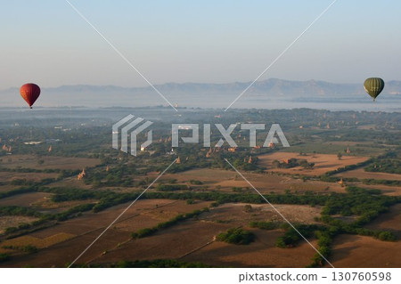Myanmar, Bagan, view from a hot air balloon, hot air balloons floating in the sky, pagodas Myanmar, Bagan, view from a hot air balloon, hot air balloons floating in the sky, pagodas 130760598