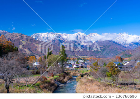 [Autumn Material] Three-tiered autumn foliage scenery seen from Oide Park in Hakuba Village in autumn [Nagano Prefecture] 130760690