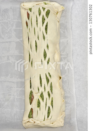 Salmon and spinach in a puff pastry 130761302