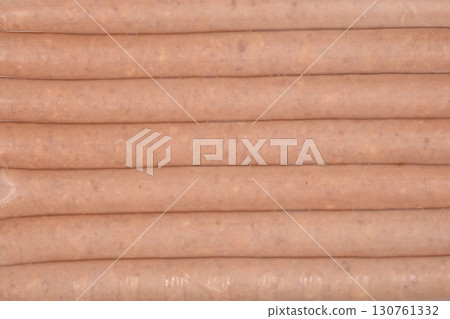 Package of raw beer sausages detail 130761332