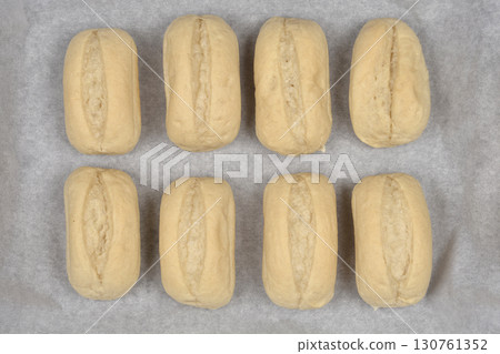 Eight raw bread rolls Eight raw bread rolls 130761352