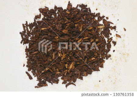 Baked grated smoked tofu in a soy and mustard marinade 130761358