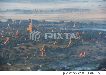 Myanmar, Bagan, view from a hot air balloon, pagodas in the morning mist 130762518