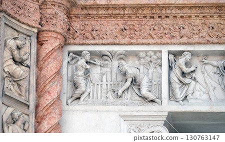 Christ in the Garden of Mary Magdalene by Zaccaria da Volterra, left door of San Petronio Basilica in Bologna, Italy 130763147