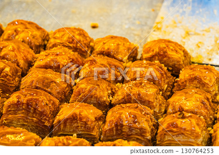 Baklava - a national Turkish dessert. Honey sweet pastry. Sweet food 130764253