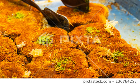 Baklava - a national Turkish dessert. Honey sweet pastry. Sweet food 130764255