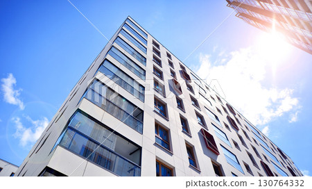 Modern elements in contemporary  architecture. Architectural details of a modern apartment building. 130764332