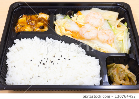 Delicious Chinese bento with stir-fried shrimp and vegetables 130764452