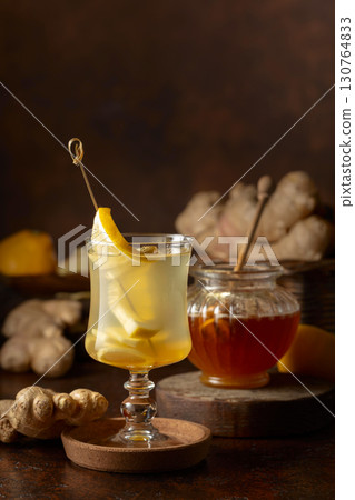 Ginger tea with lemon and honey. 130764833