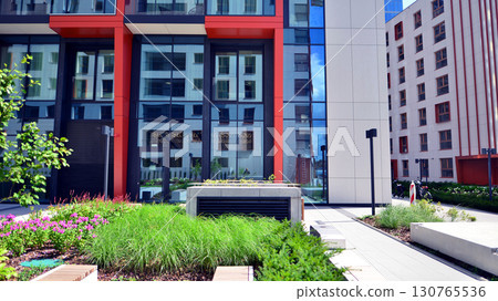 Modern elements in contemporary  architecture. Architectural details of a modern apartment building. 130765536