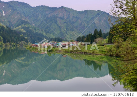 The Taishi district village reflected in the Tadami River (Mishima Town, Fukushima Prefecture) The Taishi district village reflected in the Tadami River (Mishima Town, Fukushima Prefecture) 130765618