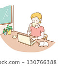 A woman working while having tea at a cafe 130766388