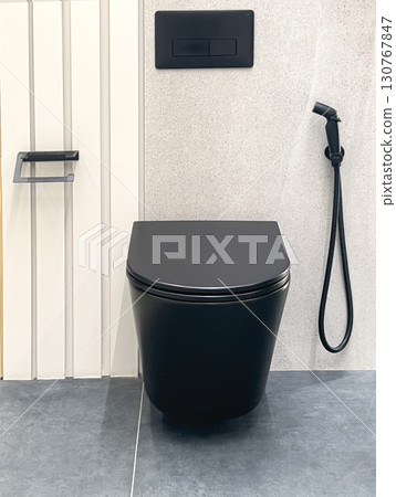 Modern black toilet in contemporary bathroom interior design 130767847