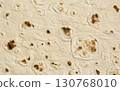 Close-up of lavash texture showing bubbles and charred spots 130768010