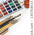 Painting equipment arranged neatly on white surface with copy space 130768015