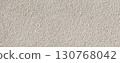 White rough plaster wall texture providing seamless background 130768042
