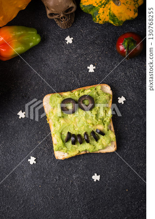 Halloween food for children, monsters toasts 130768255