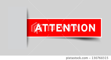 Red color square shape sticker label with word attention inserted in gray background 130768315