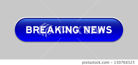 Blue color capsule shape button with word breaking news on gray background 130768325