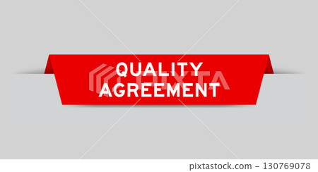 Red color inserted label with word quality agreement on gray background Red color inserted label with word quality agreement on gray background 130769078