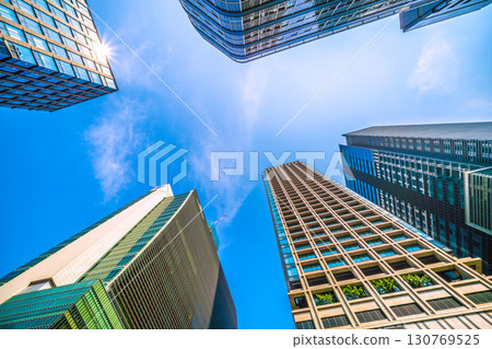 Tokyo cityscape in Japan: View of the redevelopment project and buildings in Nihonbashi 1-chome (August 21st) Tokyo cityscape in Japan: View of the redevelopment project and buildings in Nihonbashi 1-chome (August 21st) 130769525