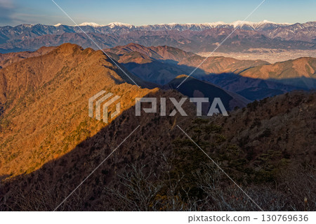 Mt. Odake and the Southern Alps mountain range seen from Mt. Yukitogatake in the Misaka Mountains in winter 130769636