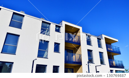 Modern elements in contemporary  architecture. Architectural details of a modern apartment building. 130769887