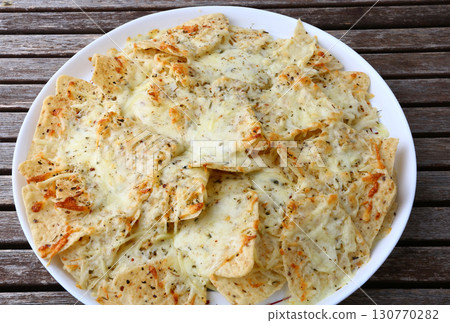 nachos as typical aperitiv mexican food 130770282