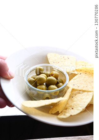 nachos as typical aperitiv mexican food 130770286