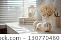 Airy Christmas Desk Decor with Pastel Accents and Vivid Ornaments 130770460