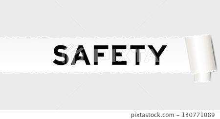 Ripped gray paper background that have word safety under torn part 130771089