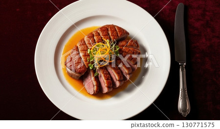 French duck a l orange a gourmet dish with seared duck breast and citrus sauce 130771575