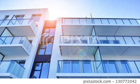Architectural details of modern apartment building. Modern european residential apartment building complex. 130772042