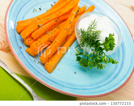 Carrot sticks with sour cream 130772133