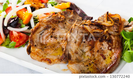 Fried pork loin with summer salad Fried pork loin with summer salad 130772240