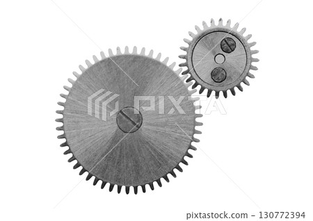 Clock mechanism metal gears isolated on white background. Macro 130772394