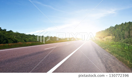 Road. Highway surrounded by summer natural landscape 130772396