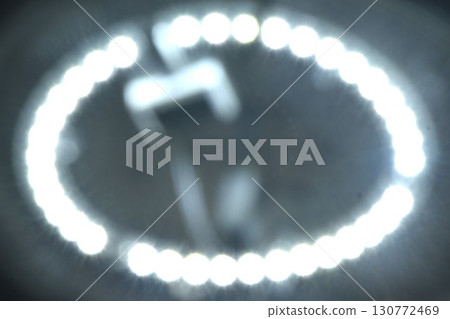 blurry LED electric lamp hanging on ceiling room in the night blurry LED electric lamp hanging on ceiling room in the night 130772469