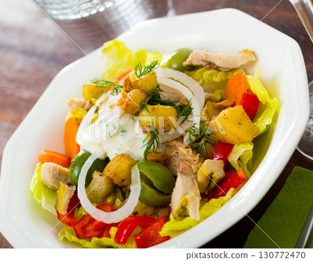 Warm salad of vegetables, chicken 130772470