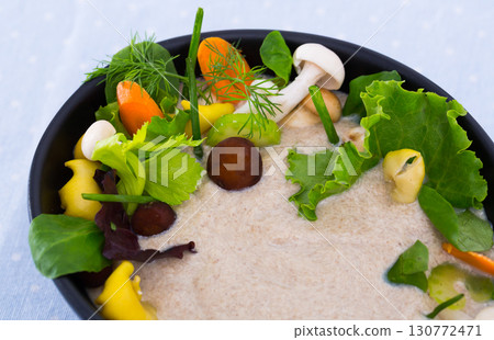 Cream soup with mushrooms and vegetables 130772471