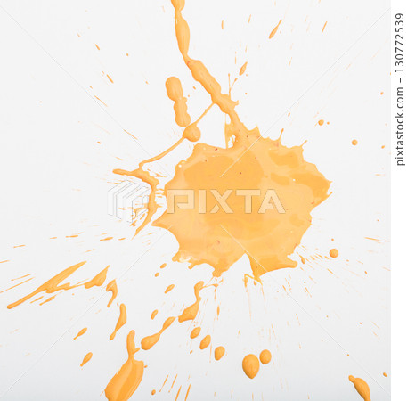 Orange paint spots on paper, colorfull artistic image on white background Orange paint spots on paper, colorfull artistic image on white background 130772539