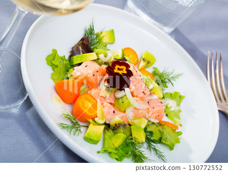 Ceviche of trout with avocado, cumquat, greens Ceviche of trout with avocado, cumquat, greens 130772552