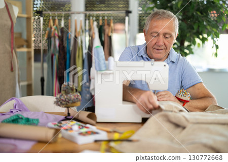 Senior man tailor at work Senior man tailor at work 130772668